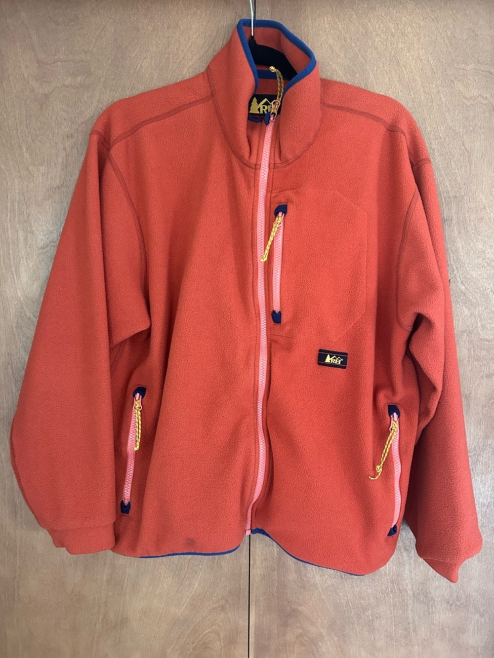 REI Orange Fleece Jacket with Yellow Accents